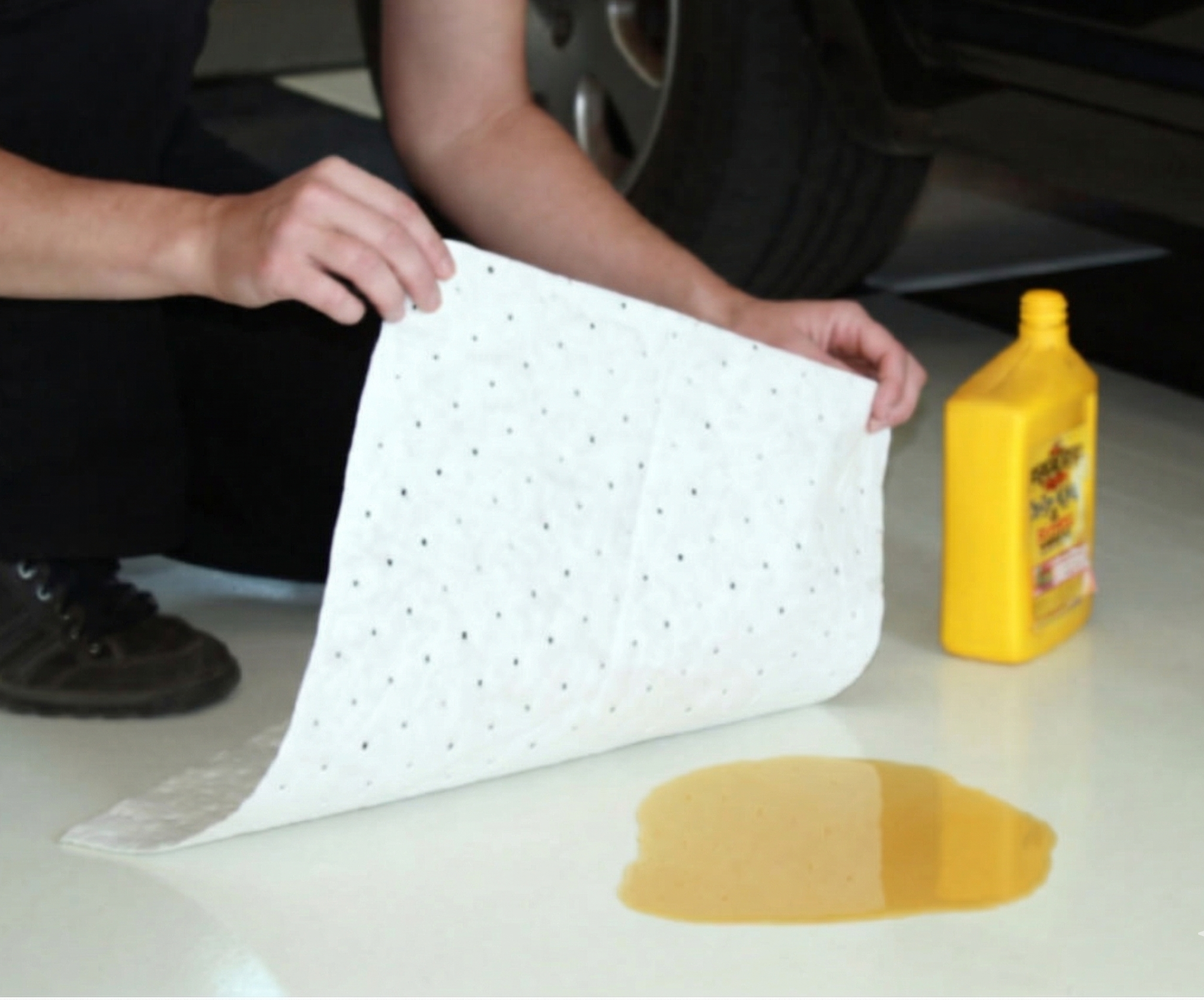 Oil Absorbent Pad In Use